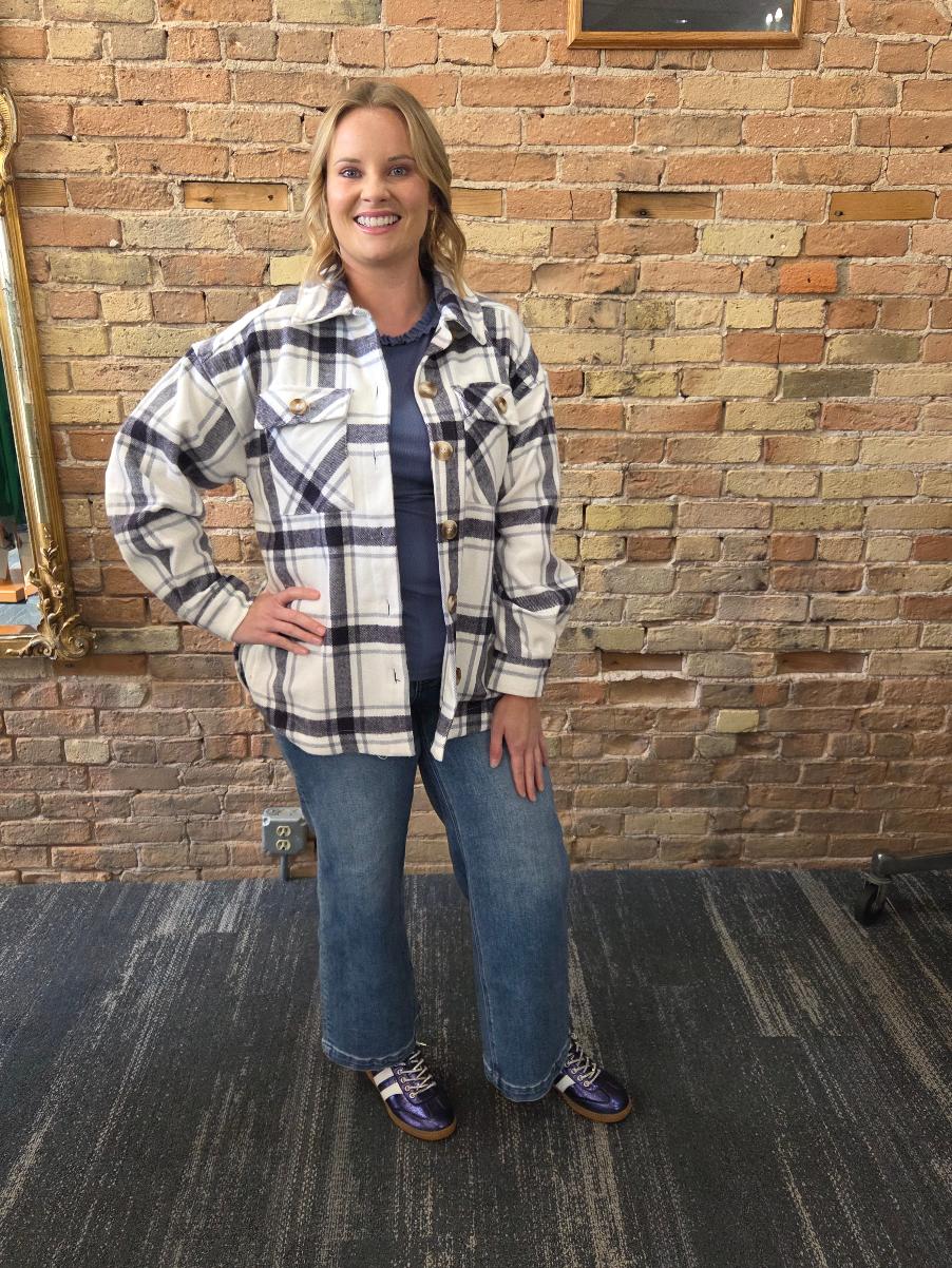 Model wearing a blue and white plaid shacket