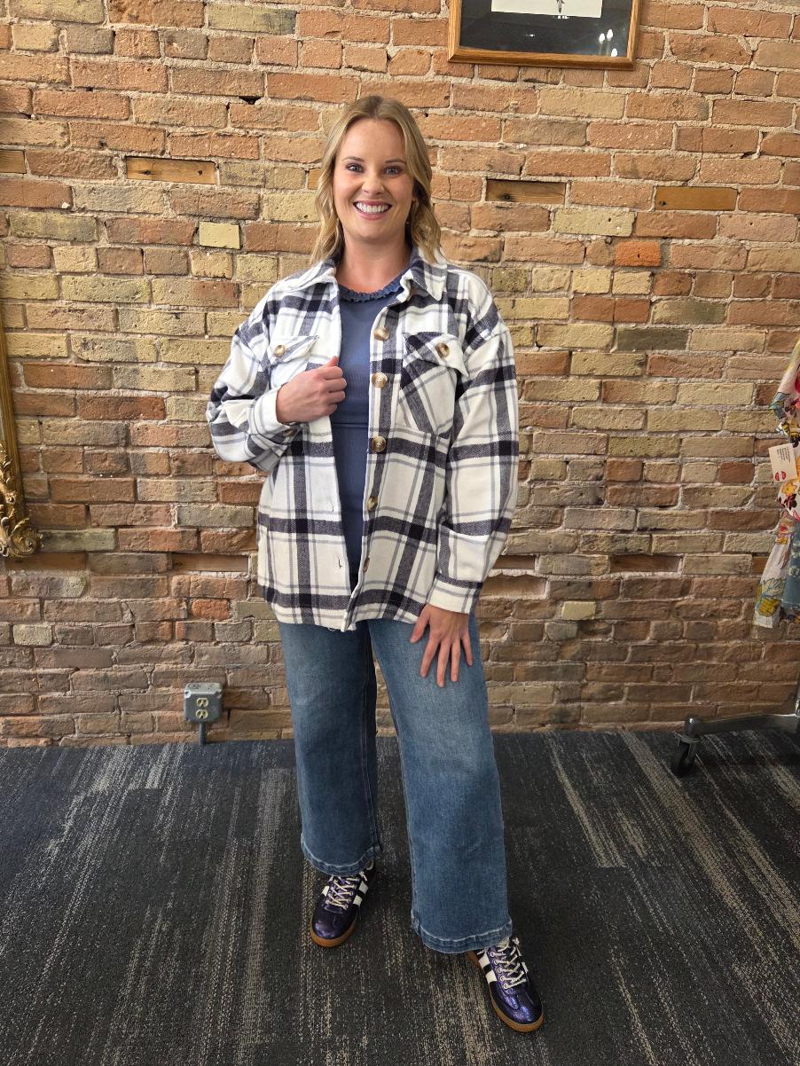 Model wearing a blue and white plaid shacket