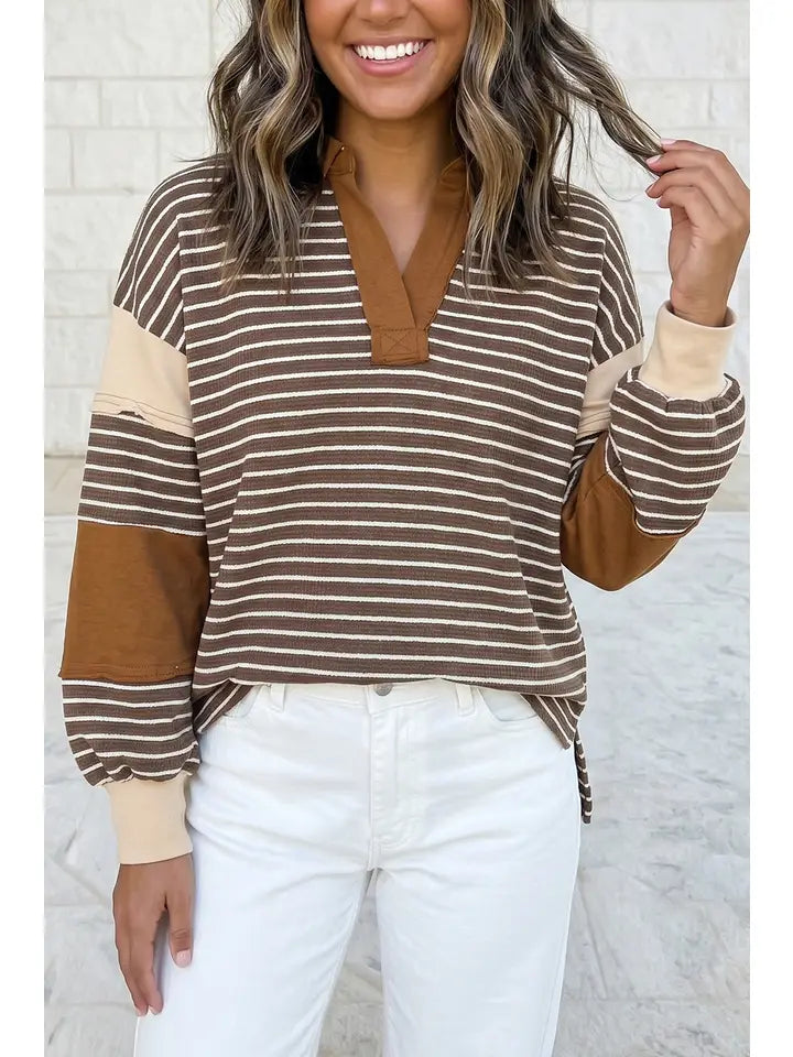 Brown and cream striped waffle-knit color block top with camel sleeve panels and faux leather elbow patches