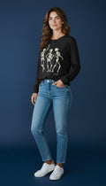 Black long-sleeve tee with three dancing skeletons graphic