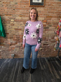 Lilac sweater with black and white daisy print