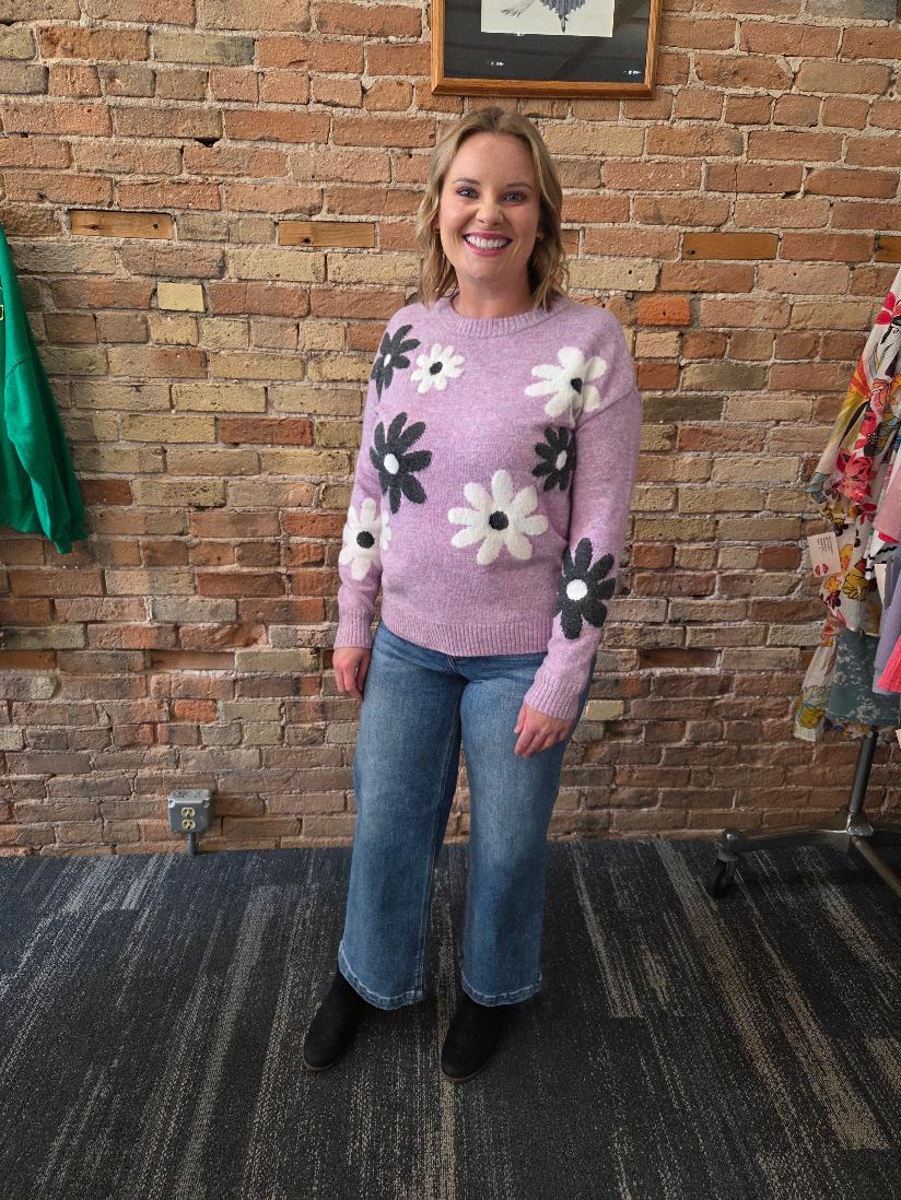 Lilac sweater with black and white daisy print
