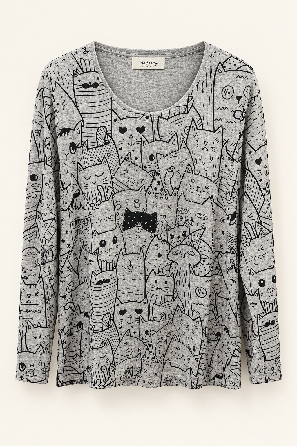 Cat-print top in a studio setting
