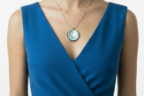 Blue mother-of-pearl pendant necklace on model